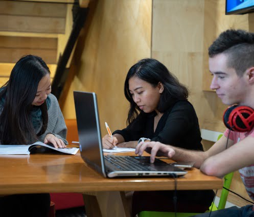 Students working together in a breakout room from the Certificate II in Workplace Skills offered by the Australian Pacific College