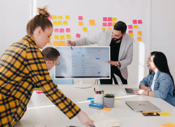 Students collaborating from the Certificate IV in Project Management Practice at the Australian Pacific College