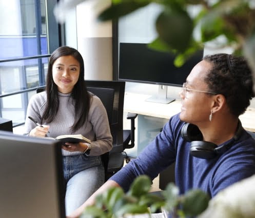 Students working together from the Advanced Diploma of Leadership and Management offered by the Australian Pacific College