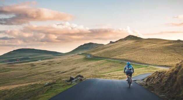 Bike rider on a mountainous road in Europe