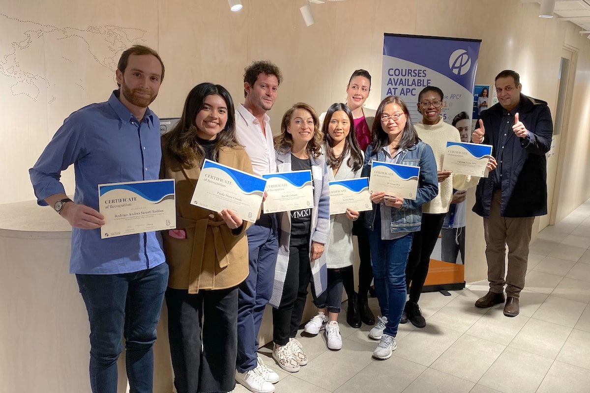 Happy students with their Certificates of completion from the Australian Pacific College